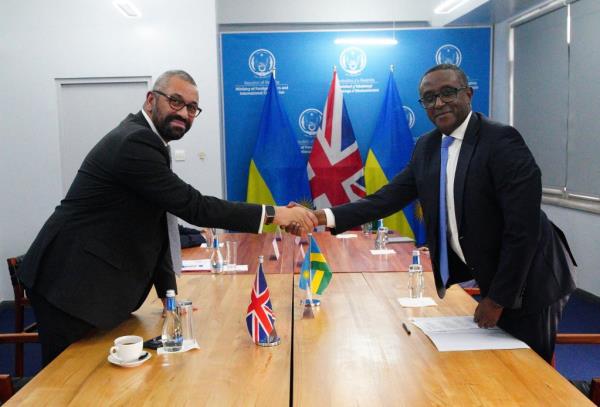 From file: The current Home Secretary, James Cleverly (L), visited Rwanda in December and co<em></em>ntinues to espouse the policy, signing a new accord with Rwandan Foreign Minister Vincent Biruta (R) | Photo: Reuters