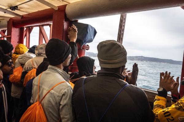 Those on board the Ocean Viking, operated by SOS Mediterranee clap as they near the port of Livorno wher<em></em>e they were able to disembark on April 10 | Source: X feed @SOSMedIntl